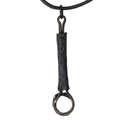 Ulvix pendant necklace by Versiliy, a handcrafted unisex pendant with natural textures and irregular organic shapes on a leather cord