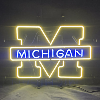 University of Michigan Logo Neon Sign illuminated in blue on metal grid backing