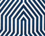 Navy blue and white velvet fabric with a geometric, symmetrical zigzag pattern forming angular shapes.