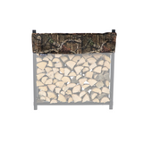 Woodhaven Short Firewood Rack Seasoning Cover in black on a firewood rack