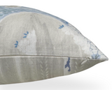 Close-up of a soft blue and beige pillow cover with a subtle willow tree pattern and a hidden zipper along the edge