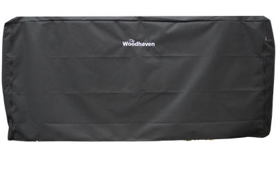 Woodhaven Full Firewood Rack Cover with zipper closure protecting stacked firewood outdoors