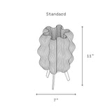 Black and white line drawing of an 11-inch tall wavy lamp with a ruffled, organic-shaped shade on three slender legs, shown with width of 7 inches.