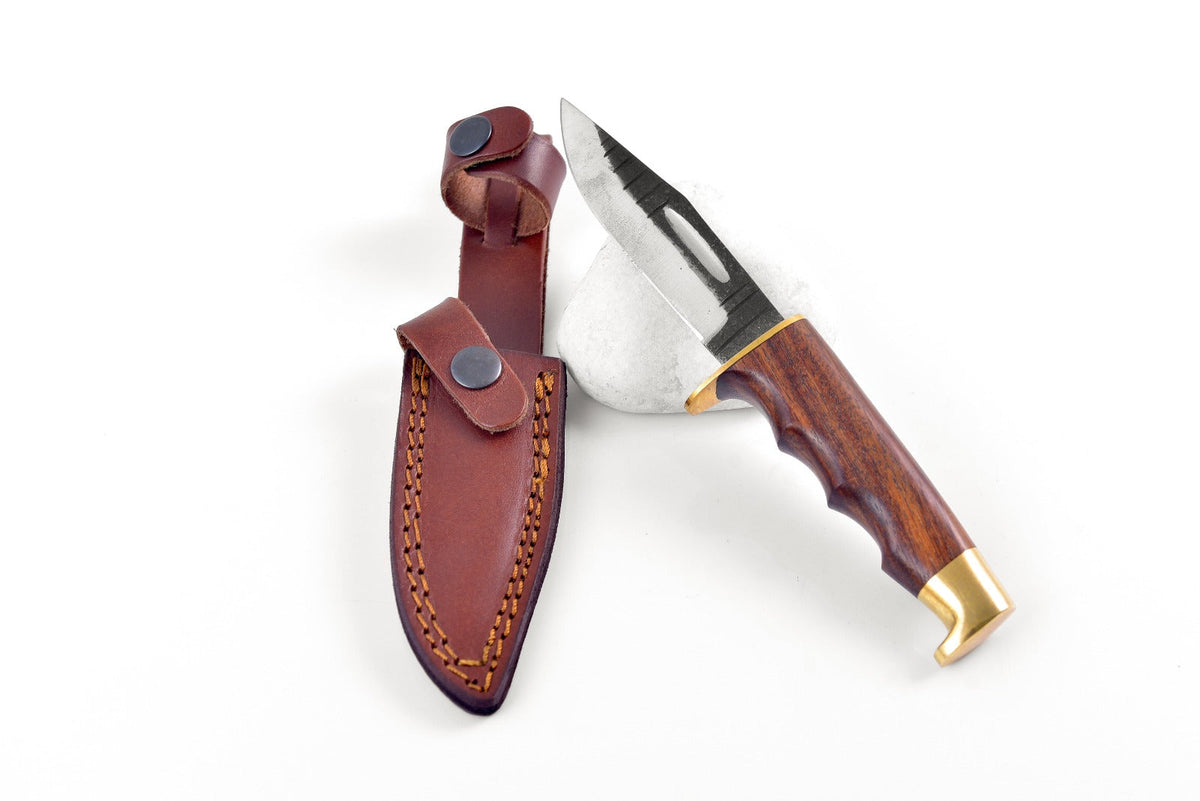 Titan Handmade Carbon Steel Utility/Camping Knife Nomad's Companion TC-101 laying on a wooden surface