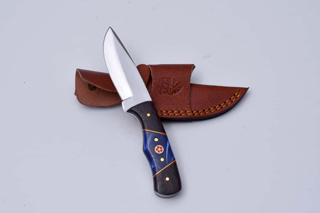 Skinner Knife - TS-3 with hardwood and blue resin handle, D2 steel blade, and leather sheath