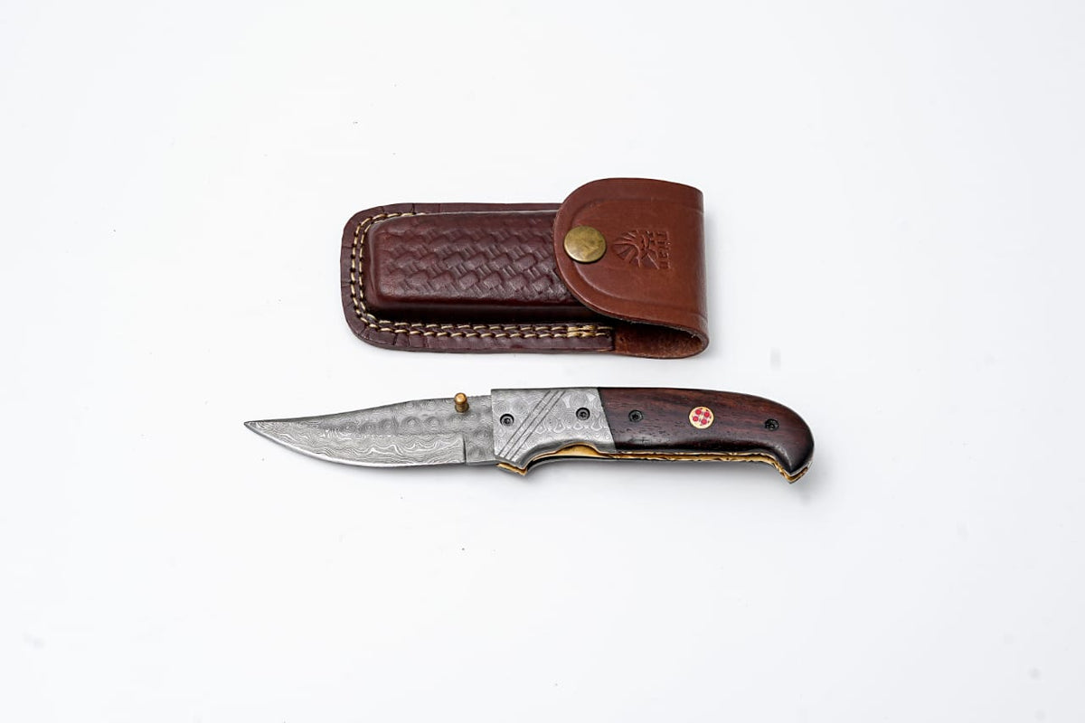 Titan classico Raindrop Damascus folding blade with walnut wood handle and custom sheath