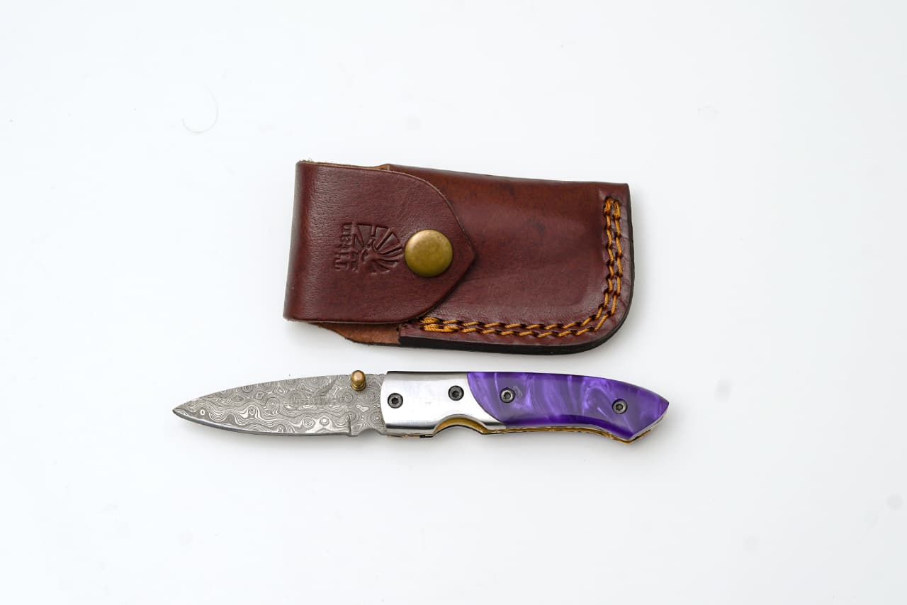Handmade Damascus AmethystEdge Folding Pocket Knife with purple resin handle and leather sheath