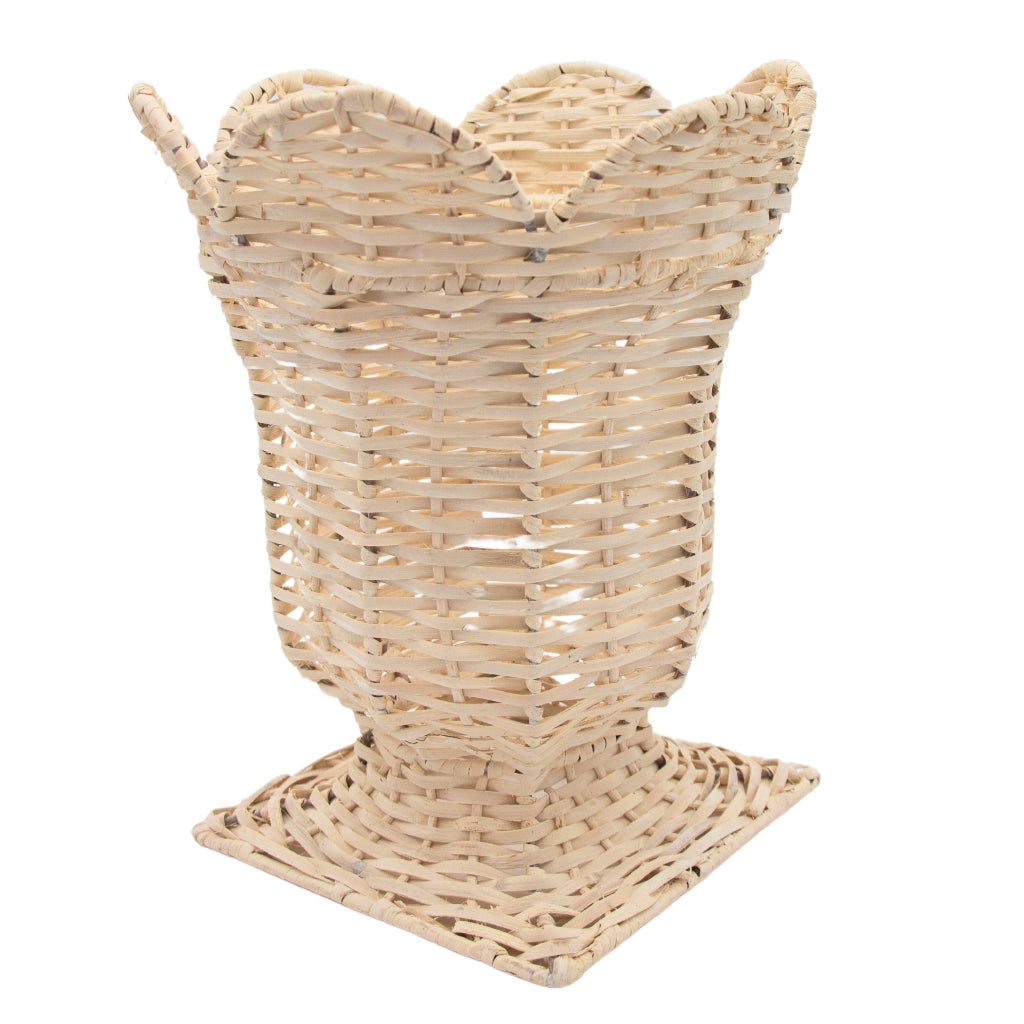 Tall white wicker urn vase with flared petal-shaped top and square woven base, showcasing an open lattice pattern and light natural finish.