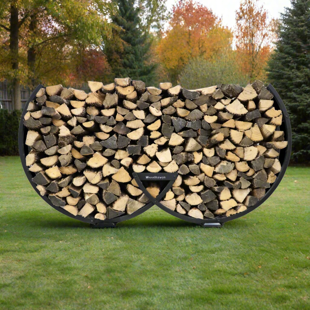 Winter Workman firewood rack by The Woodhaven showing curved steel design and wood storage
