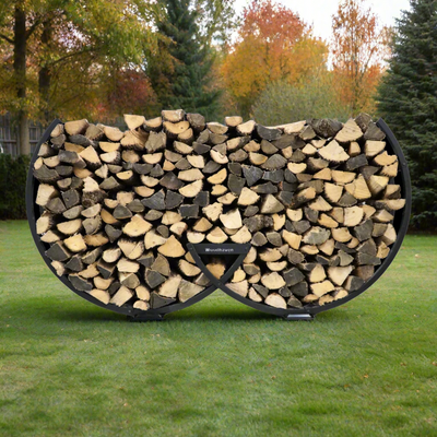 Winter Workman firewood rack by The Woodhaven showing curved steel design and wood storage