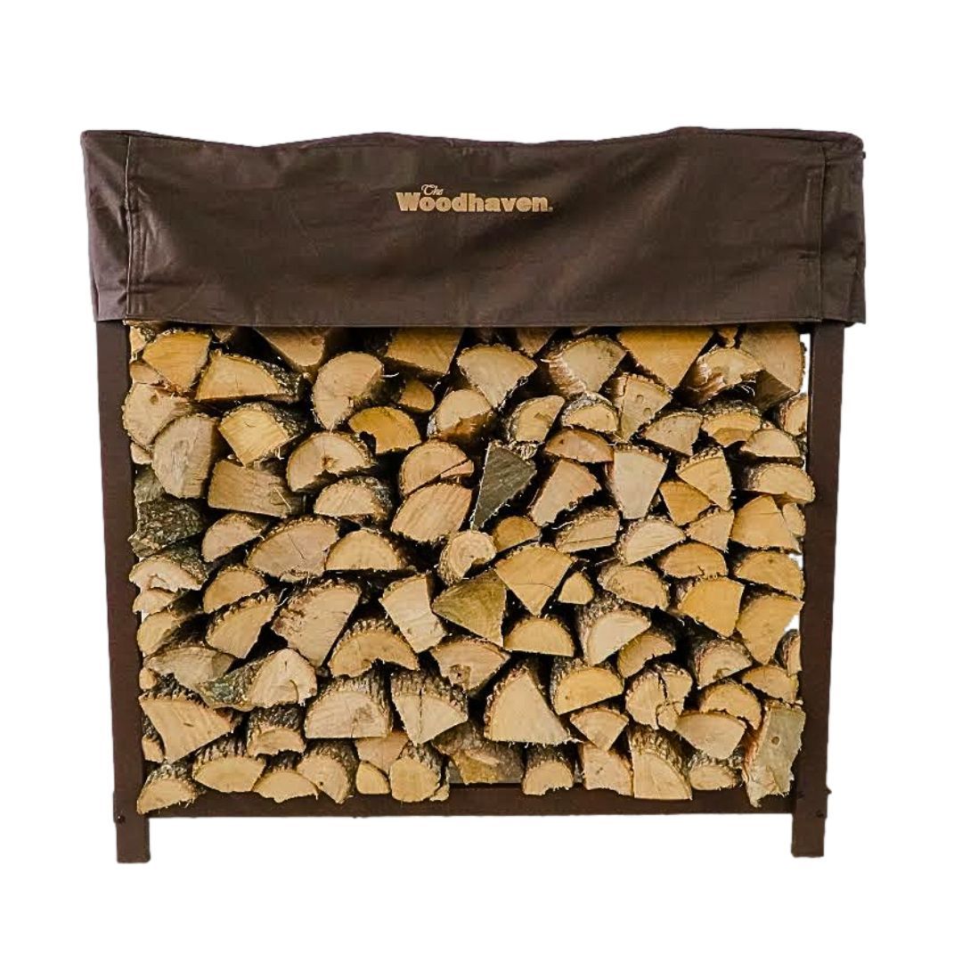 Woodhaven 4 ft Firewood Rack holding stacked firewood outdoors
