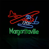 Neon sign of a red Wright airplane with blue floats and green text reading 'Margaritaville' below on black background.