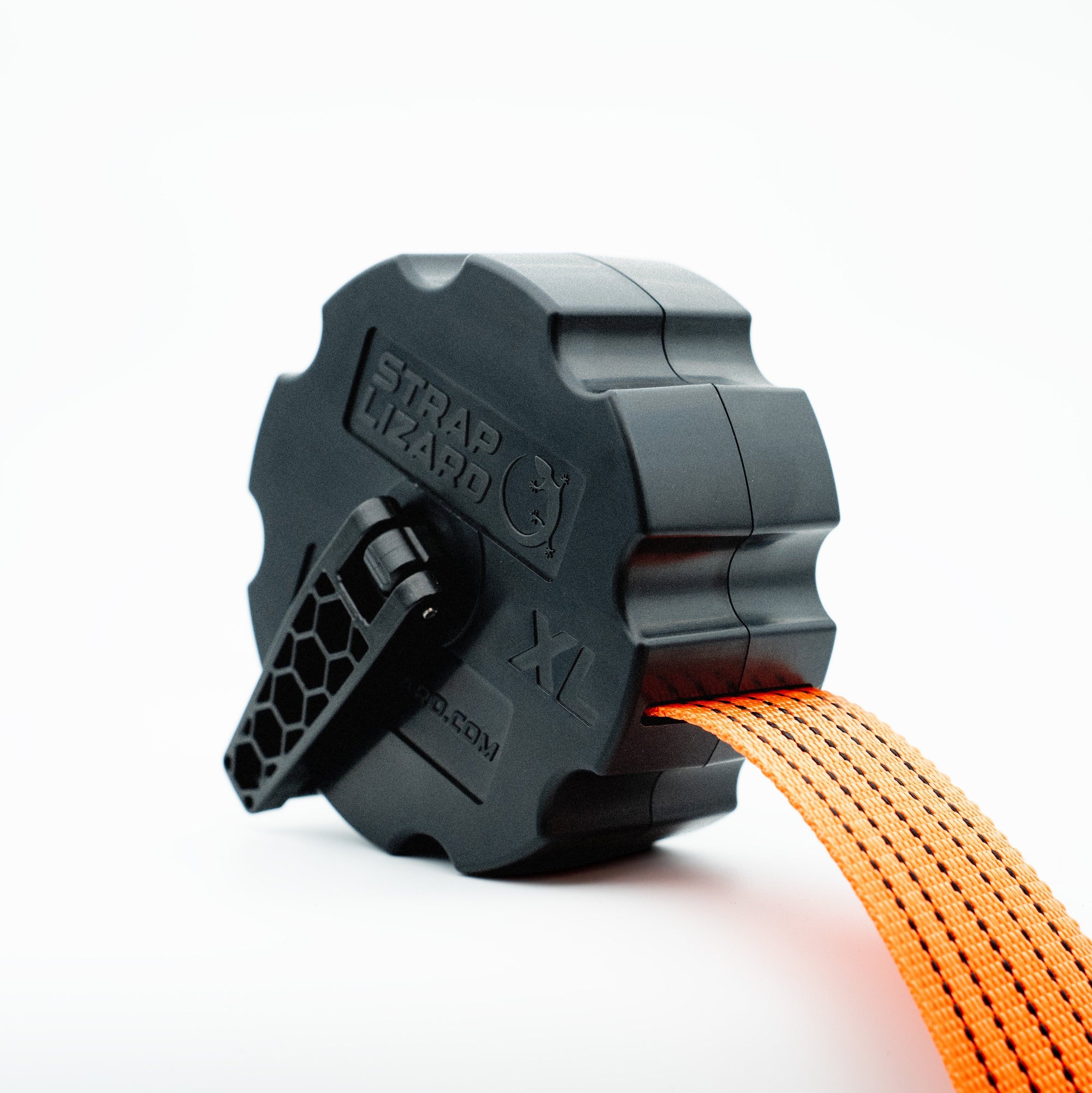 Strap Lizard XL in black coiled holding large ratchet strap