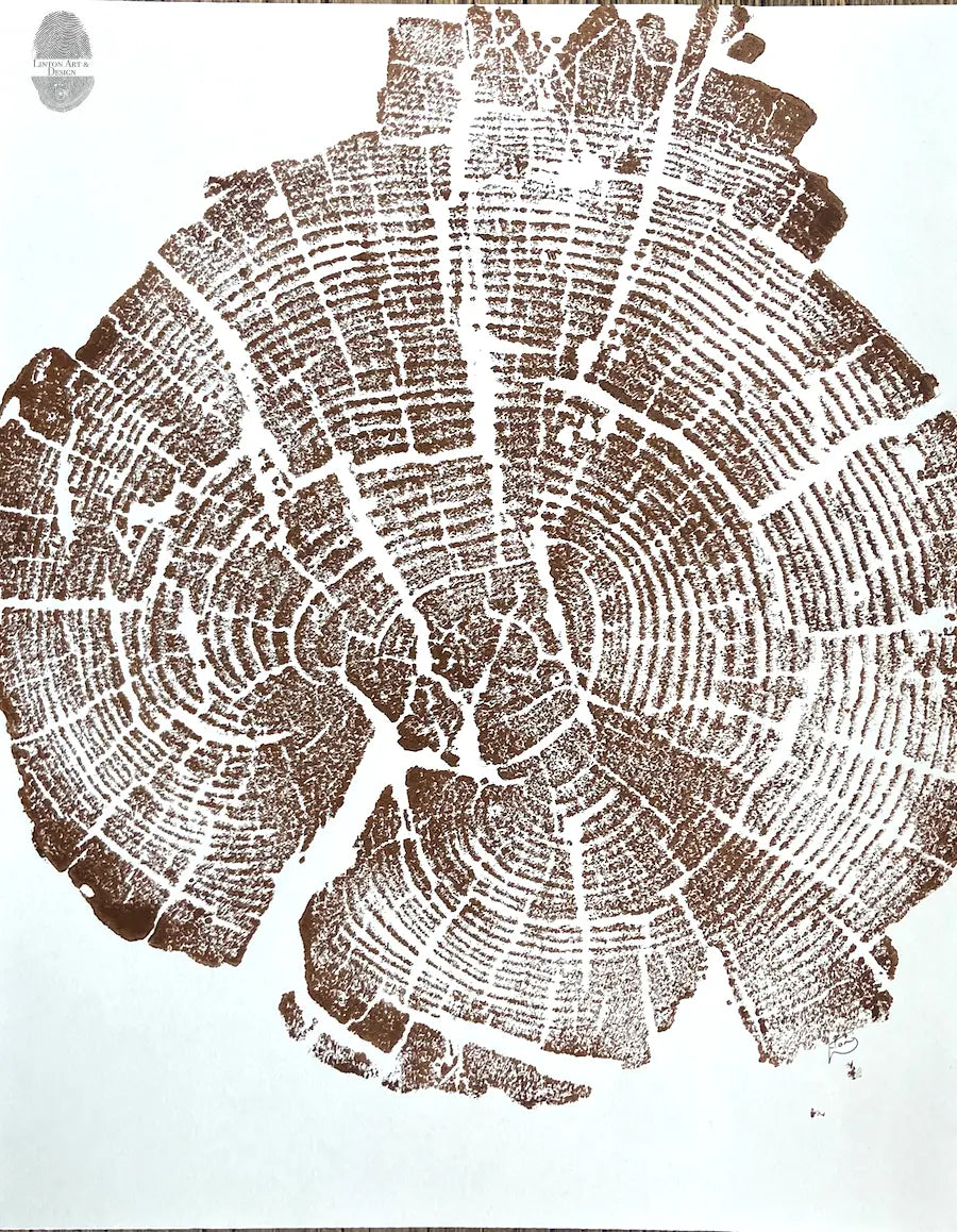 Brown ink woodblock print of a tree cross-section showing detailed growth rings and natural cracks on white paper.