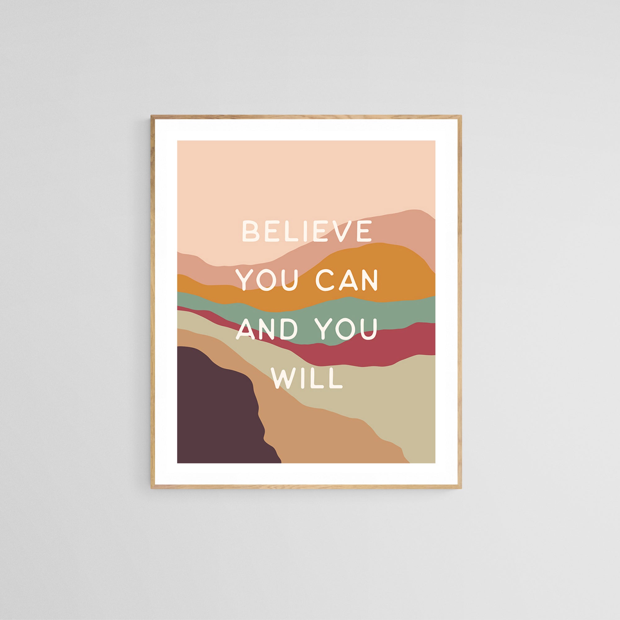 Framed Believe You Can modern art print by Alicia Bock Print Shop hanging on a neutral wall