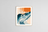 Modern art print with layered abstract shapes in orange, teal, beige, and navy, featuring the script text 'Chase The Sun' in white cursive letters.