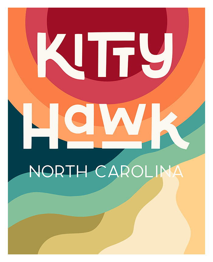 Framed Destination: Kitty Hawk modern art print hanging above a wooden cabinet.