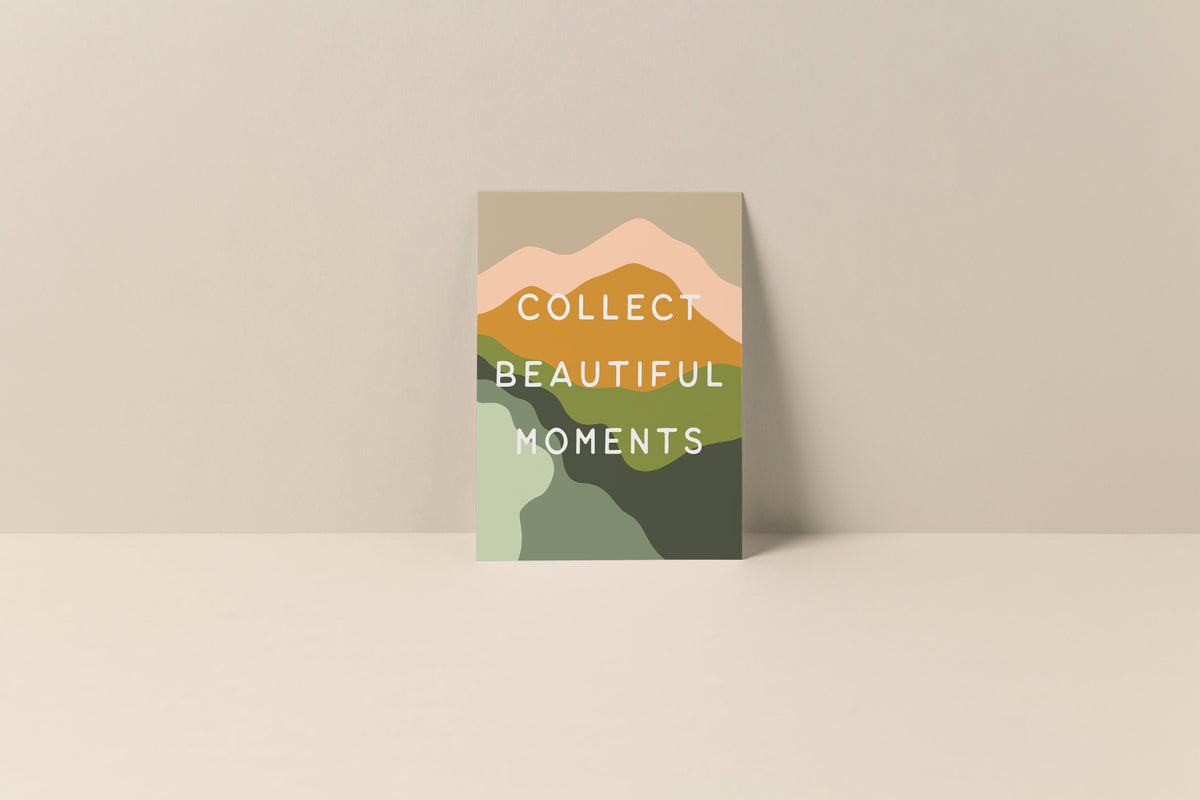 Note card with abstract landscape in muted earth tones and text reading 'Collect Beautiful Moments' in white uppercase letters centered on cream background.