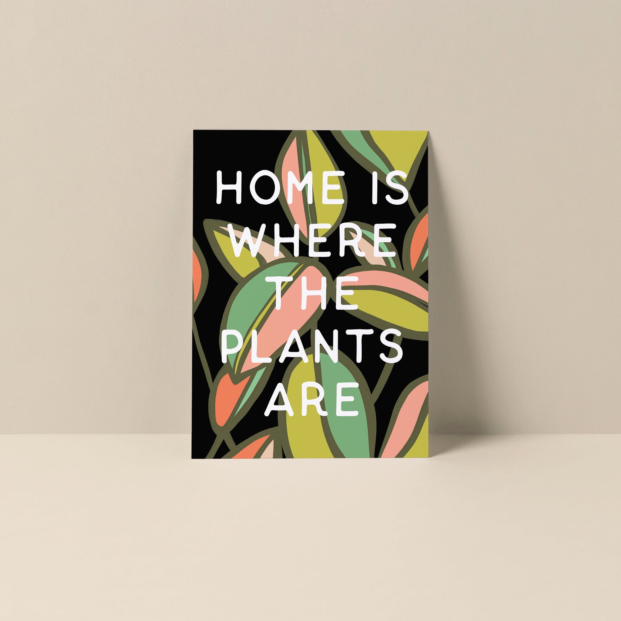 Home Is Where The Plants Are blank notecard featuring green leaves artwork and text
