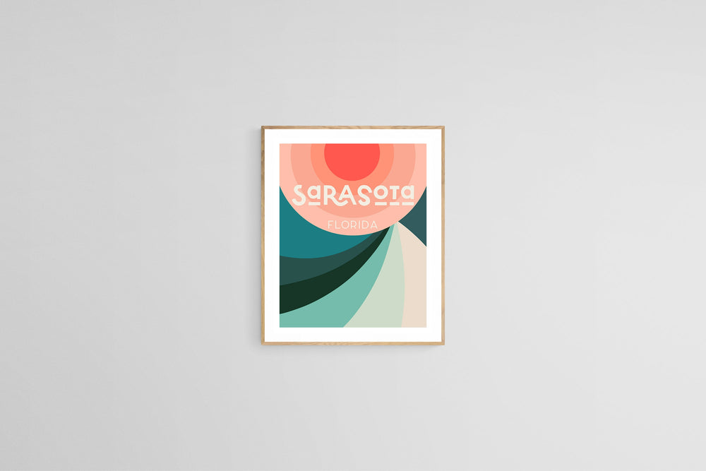 Modern art print titled 'Destination: Sarasota' featuring abstract shapes in coral, cream, teal, and dark green with stylized 'Sarasota Florida' text at the top center.