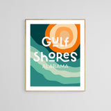 Modern art print with layered teal and green waves and an orange circular sun, featuring stylized white text saying 'Gulf Shores Alabama' in geometric fonts.