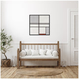 Square framed abstract artwork with gray, white, and red sections separated by black lines, hanging above a wooden bench with white cushions in a neutral-toned room.