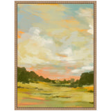 Landscape painting with soft green fields, dark green trees, and a pastel sky featuring light blue, yellow, and orange clouds, framed in a beaded wood frame.