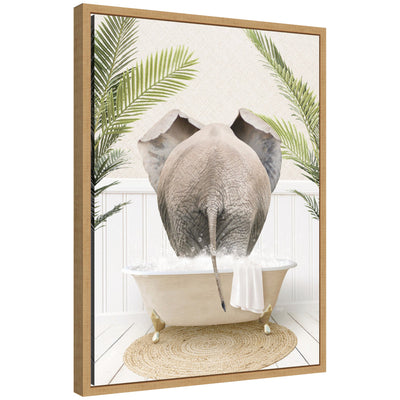 Sylvie Elephant Back in Palm Bathtub framed canvas art showing an elephant with palm leaves in the background
