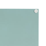 Close-up of the corner of a light blue rectangular decorative tray with a small round white silicone footpad visible at the top right edge.