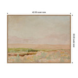 Framed canvas wall art depicting a muted desert landscape with soft pink skies and a greenish-brown terrain, sized 42 by 32 inches, in a beaded wooden frame.