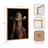 Portrait of a brown horse wearing a weathered western cowboy hat against a black background, framed in a natural oak wood frame with a minimalist gallery profile.