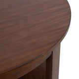 Close-up of a round coffee table with a smooth, dark brown wood surface and matching wood legs, showing fine grain and subtle natural variations.