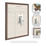 Rectangular linen fabric pinboard with printed library card design, framed in dark brown wood, displaying two black-and-white pinned photos, viewed from an angle.