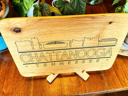 Handmade white oak charcuterie board with engraved Chattanooga skyline