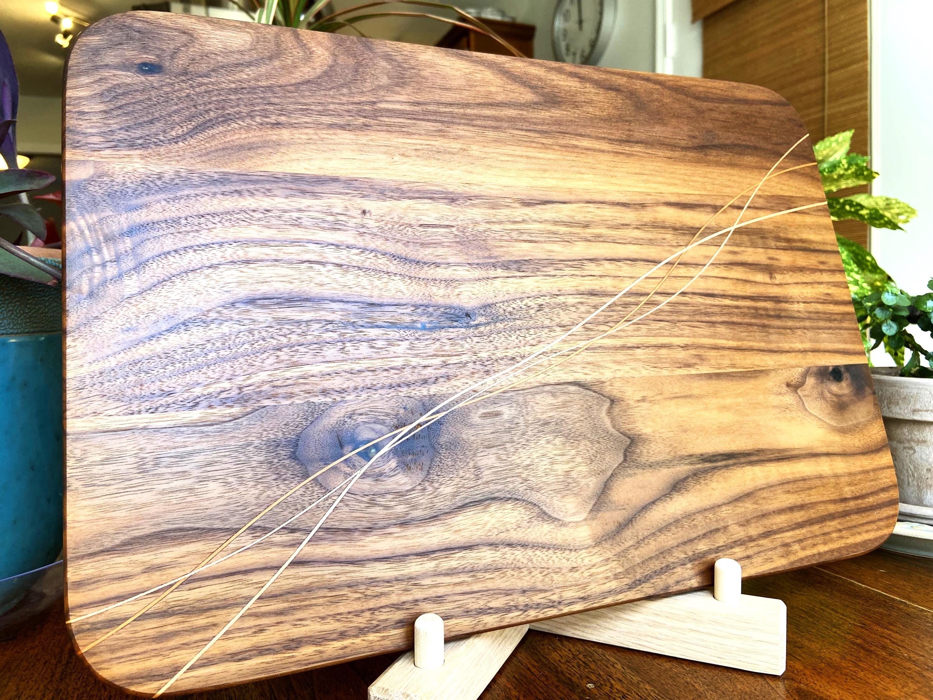 Walnut charcuterie board with Cherry and Maple decorative banding, handcrafted by Fitzgerald Custom Woodcraft