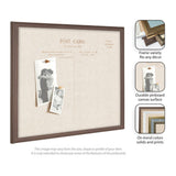 Rectangular pinboard with beige linen fabric surface and dark brown wooden frame, showing two vintage black-and-white photos pinned on it.