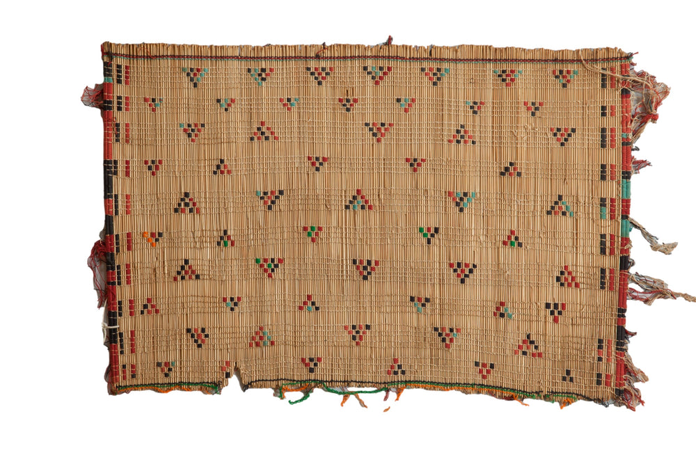 Vintage African Tuareg Rug Mat showing handwoven straw patterns and tassels