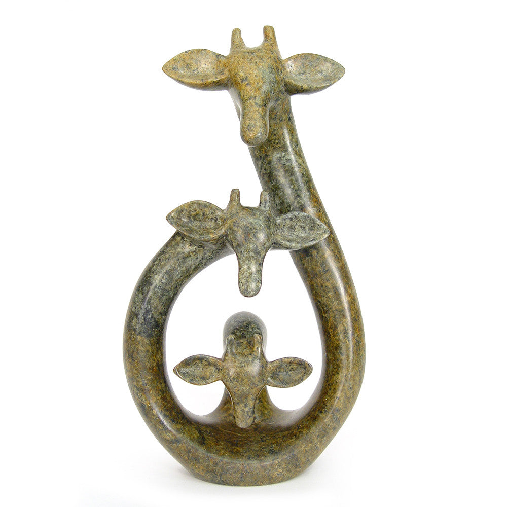 Abstract stone sculpture of a family of three giraffes carved from serpentine with varied earthy colors