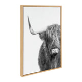 Black and white side portrait of a Highland cow with long shaggy hair partially covering its face and one large curved horn, framed in light wood.