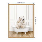 White polar bear mother tenderly hugging her cub while sitting together in a vintage white clawfoot bathtub on a wooden floor with a white paneled wall background.