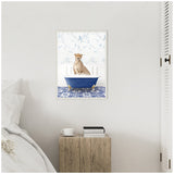 Framed canvas of a cheetah sitting in a deep blue bathtub with gold claw feet, set against a floral wallpaper and vivid blue mosaic floor tiles.