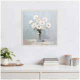 Square framed painting of white daisies arranged in a clear glass jar on a muted blue background, hanging above a white dresser decorated with plants and books.