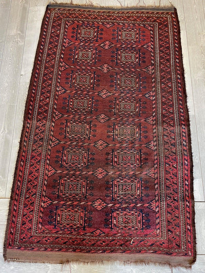 Antique 1880’s Baluch Rug displaying geometric patterns and rich aged texture