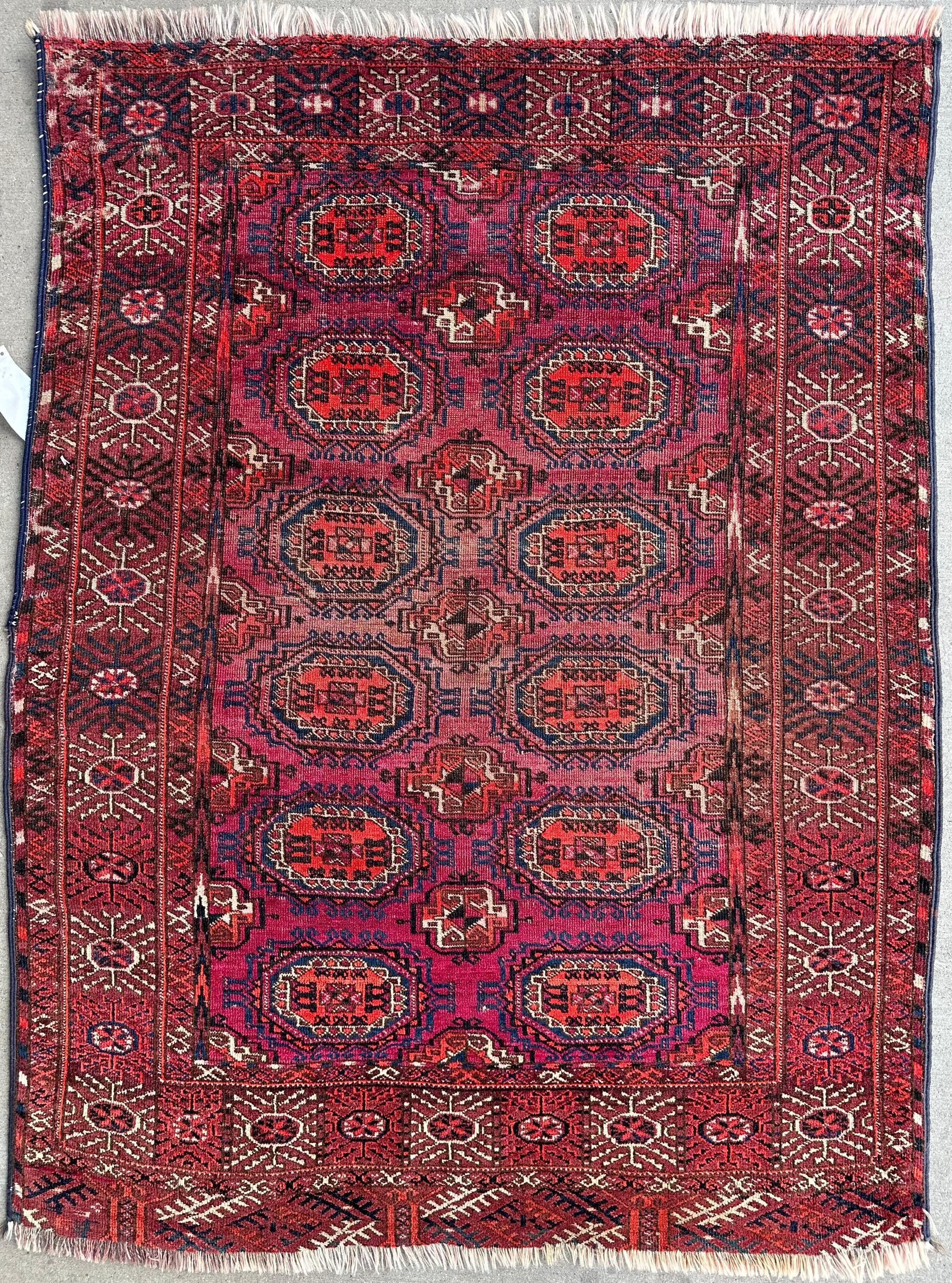 Antique 1910’s Tribal Turkoman Rug 3’ x 4’1” showing detailed tribal pattern and wear