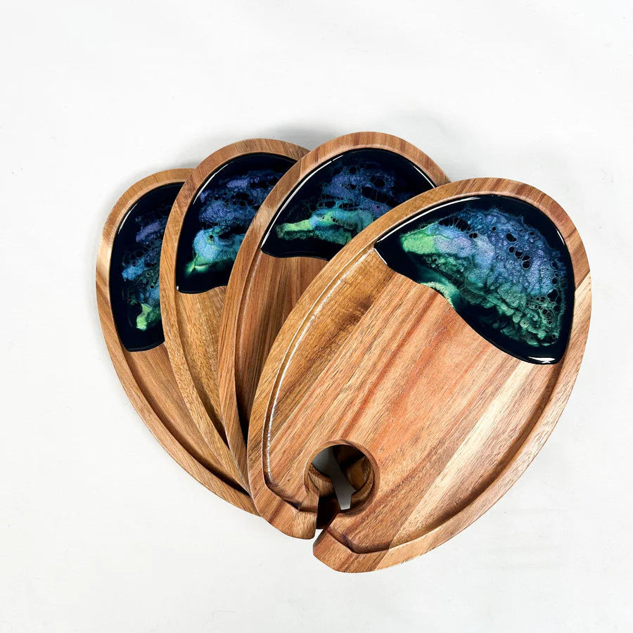 Set of wooden resin Wine & Appetizer Trays with embedded colorful stones on a white background
