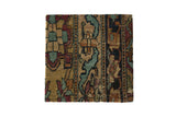 Decorative cork board featuring antique Kerman rug fragment with red and blue pattern and concealed cork backing
