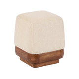 Square beige fabric ottoman with smooth rounded corners set on a dark brown wooden base with subtle carving details