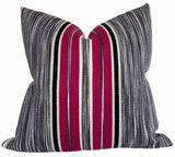 Audley Stripe Pillow Cover in Berry showing red and muted tones of stripes on chair