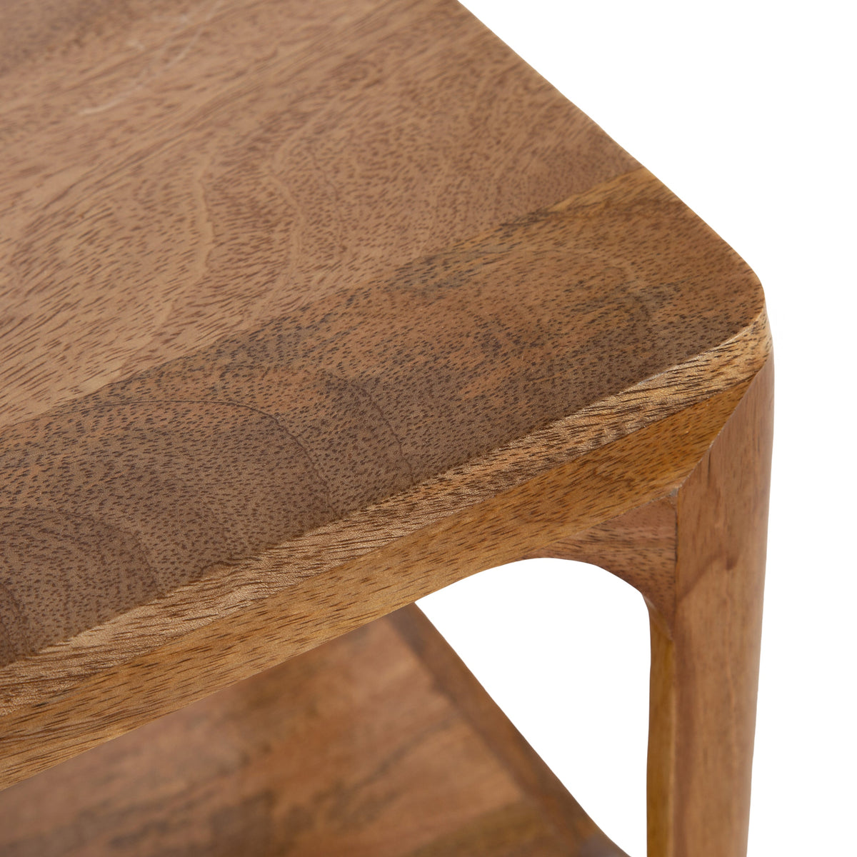 Close-up of a corner of a wooden Dahl Floating Side Table showing smooth rounded edges and finely grained wood surface with a connecting lower shelf beneath