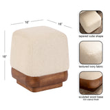Ivory textured fabric ottoman with a tapered cube shape and a rich walnut-finished sculpted wood base, measuring 16 inches square and 18 inches tall.